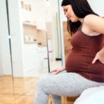 Pregnant woman having back aches